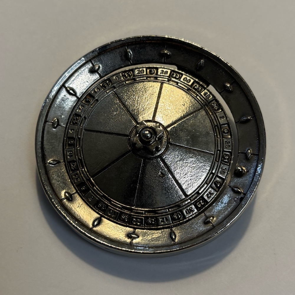 Belt buckle spinning roulette wheel. Made by silver star.